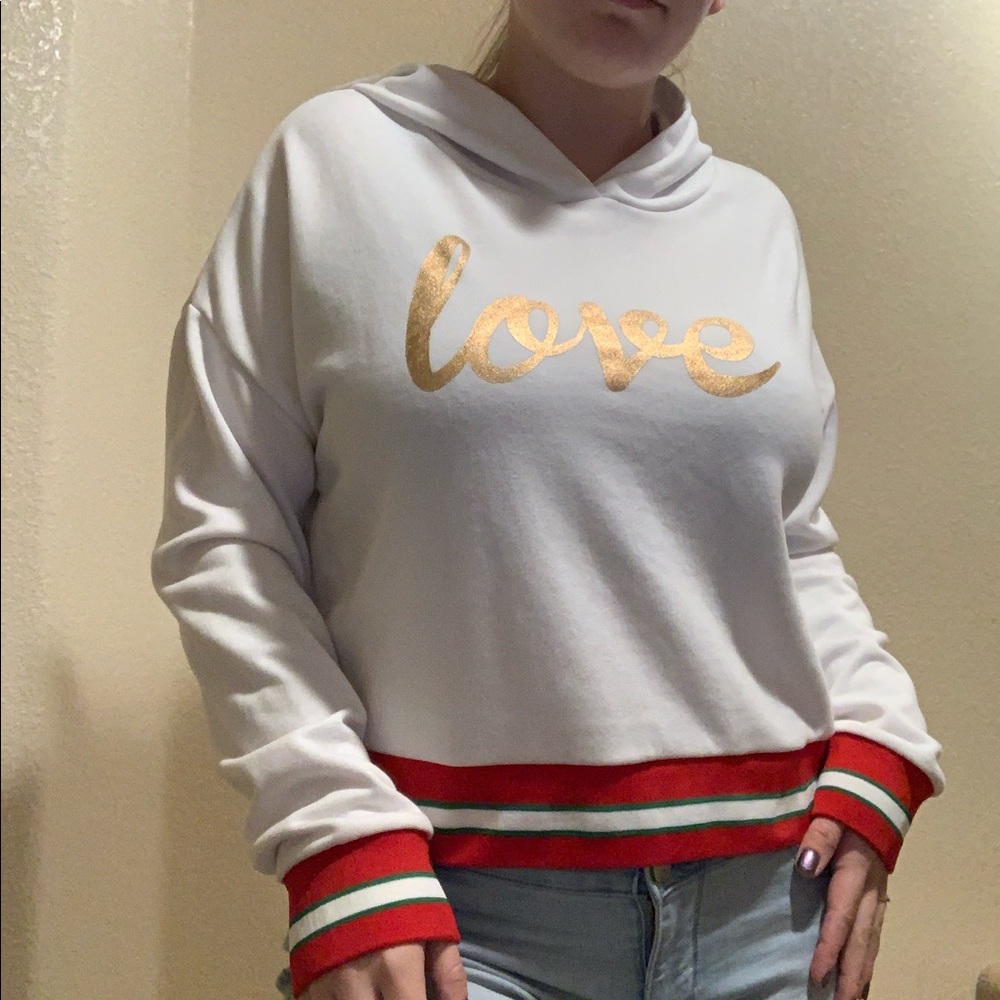 Oversized Love sweater w/ red and green hem